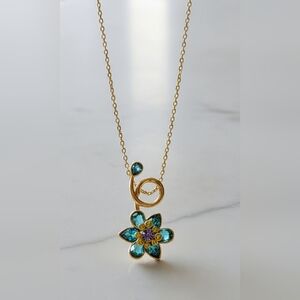Swarovski Idyllia pendant necklace - Mixed cuts, Flower, Blue, Gold-tone plated